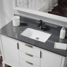 This makes a big difference in the space and layout of your bathroom. Rene Under Mount Porcelain Bathroom Sink In White With Pop Up Drain In Antique Bronze R2 1001 W Pud Abr The Home Depot