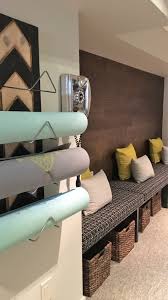 Yoga studio storage #yoga #studio #storage #ideas #yogastudiostorageideas storage idea for new studio and you could do it with foam rollers too. Modern Home Gym Decor Yoga Mat Holder Custom Cushions Gym Storage Solutions Stickwood Accent Wall Home Gym Decor Workout Room Home Gym Room At Home