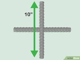 Two opposing players attempt to hit a ball that some tetherballs come with a cord attached; How To Make A Tether Ball Court 12 Steps With Pictures