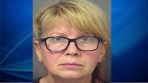 Trial postponed for woman charged with 1990 clown killing of lover's wife