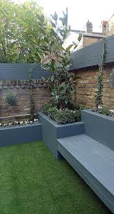 Grey Colour Scheme Raised Beds Agapanthus Olives Artificial Grass Porcelain Grey Tiles Grey Floating Bench Lighting Balham Clap Tuin Ideeen Tuin Tuin En Terras