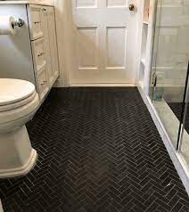 These mosaics and tiles are great when used in conjunction. Nero Marquina Black Marble 1x3 Herringbone Honed Mosaic Tile Basement Bathroom Design Herringbone Tile Floors Herringbone Marble Floor