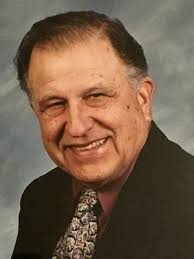 E. John Mills Obituary