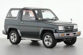 Image result for Shooting White 1966 Daihatsu