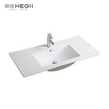 4.8 out of 5 stars 7. Hegii European Design Rectangular Sanitary Ware Long Narrow Bathroom Vanity Sink Ceramic Above Cabinet Wash Basin Buy Bathroom Vanity Sink Above Cabinet Basin Vanity Cabinet Basin Product On Alibaba Com