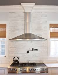 Kitchen Range Hood I Like The Crown Molding But The Seam In The Duct Cover Would Make Me In Creative Kitchen Backsplash Kitchen Range Hood Kitchen Renovation