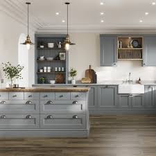There are some beautiful dark coloured kitchen units and doors available at the moment but not everyone who goes for a dark kitchen unit colour wants a dark worktop so there is a significant trend to use light, or even white, worktops. Light Grey Shaker Kitchen White Worktops Howdens Joinery Stock Pin On Real Customer Kitchens Howdens Really Do It All Right Down To The Kitchens Sink