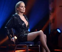 Stone in scenes from basic instinct with michael douglas (top left) and director paul verhoeven (center).© tristar pictures/everett collection. Sharon Stone Recreates Iconic Basic Instinct Scene At Gq Men Of The Year Awards In 2020 Basic Instinct Gq Men Sharon Stone