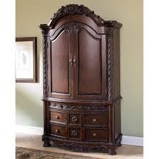 North Shore Armoire Millennium In Armoires And Wardrobes A Rich Traditional Design And Exquisite Details Come Together Shore Bedroom Armoire Ashley Furniture