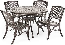 Amazon Com Christopher Knight Home Hallandale Outdoor Cast Aluminum Dining Set For Patio Or Metal Patio Furniture Patio Dining Furniture Iron Patio Furniture