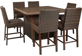 If you click a link on this page and make a purchase, i may receive a commission but it won't cost you any more. Signature Design By Ashley Paradise Trail 7 Piece Outdoor Firepit Table Set Lindy S Furniture Company Outdoor Pub Dining Sets