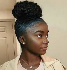 An excellent hairstyle idea for women who think are short or want to look taller. Updo Hairstyles For Black Woman Black Women Updo Hairstyles Natural Hair Styles Natural Hair Bun Styles