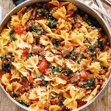 Stir in 1/2 cup cheese; Tomato Spinach Sausage Pasta Recipe How To Cook Sausage Pasta Eatwell101