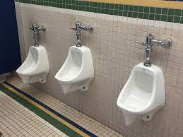 The Lack of Urinal Dividers Pisses off Male Students - The Observer