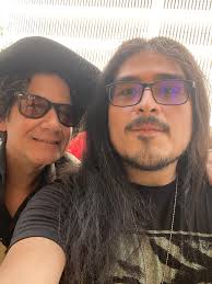 Meeting original band members and seeing historic microphone