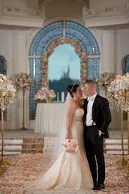 This Walt Disney World Couple Is Absolutely Swimming In Floral At Disney S Wedding Pavilion Pho Disney Wedding Disney World Wedding Disney Fairy Tale Weddings
