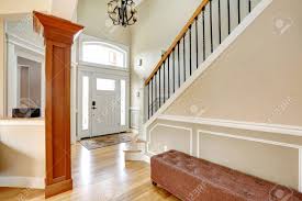 Now offers wood cable railing systems! Luxury Home Interior View Of Entrance Door Stairs With Iron Stock Photo Picture And Royalty Free Image Image 27262072