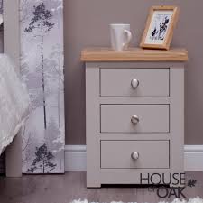 The contemporary nightstand is built with an engineered wood and cardboard frame with a rich mahogany finish. Diamond Grey 3 Drawer Bedside Cabinet House Of Oak