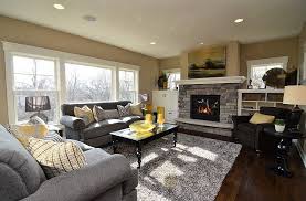 Due to its versatility, beige enables you to create a monochromatic interior using two or more tones. Gray And Yellow Living Rooms Photos Ideas And Inspirations Tan Walls Living Room Grey And Yellow Living Room Yellow Living Room