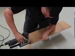 How To Lay Laminate Flooring Going Through A Doorway Laying Laminate Flooring Laminate Flooring Inexpensive Flooring