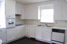 Refinishing kitchen cabinets is an excellent frugal alternative to installing new cabinets, which can cost thousands of dollars (say what?!). Painting Oak Cabinets White An Amazing Transformation Lovely Etc