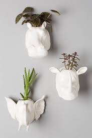 White & modern ceramic wall planters. 8 Simple Ways To Create An Indoor Vertical Garden In Your Home