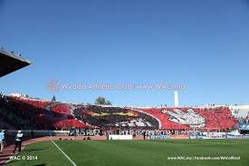 Crée pour combattre l'injustice, l'oppression et l'intolérance, le wydad est rapidement devenu un instrument nationaliste capable à lui seul d'éveiller les foules et de raviver les espoirs. Wydad Casablanca Kawkab Marrakech 22 02 2014 Soccer Field Marrakech Casablanca