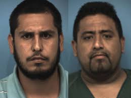 2 arrested in case of woman's body found burned in field