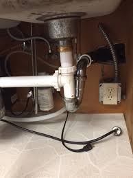 End outlet disposer kit into a double bowl sink with a garbage disposal. Garbage Disposal Drain Is Slightly Higher Than Drain Pipe Home Improvement Stack Exchange