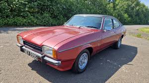 Image result for Jupiter Red 1978 Capri