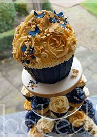 It's happened to the best of us! Royal Blue And Gold Cupcake Wedding Tower Cupcake Tower Wedding Blue Bridal Shower Blue Cupcakes