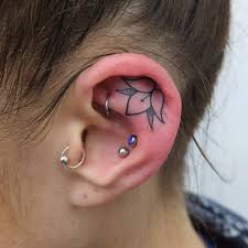 Many people with hummingbird tattoo behind their ear shared that the tattoo encouraged them to stay down to earth, but speak up when needed. 284 Mentions J Aime 3 Commentaires Purple Sun Tattoo Piercing Purple Sun Brussels Sur Instagram Quot Handpoked Flor Ear Tattoo Tattoos Picture Tattoos