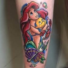 The arm is a large canvas and people choose to utilize this space by creating unique full and half (forearm)sleeve little mermaid tattoo designs. Pin On Crtani Likovi