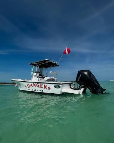 Embark on an Exclusive Key West Adventure with Danger Charters' newest  private charter boat! 🚤🏝️ Step aboard our 24' center console for a  private journey through the stunning waters of Key West.