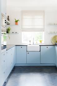 2019 kitchen design trends, warm hardware finishes and bold cabinetry colors in blue feauturing cafe appliances in matte white with brushed bronze hardware. 43 Best Kitchen Paint Colors Ideas For Popular Kitchen Colors