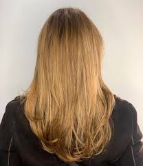 What keeps this hairstyle from looking juvenile, is the curls that start mid shaft and flow to the ends for a super soft feminine look. Haircut Los Angeles Hair Sculpting Sager French Salon