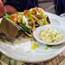 That's the way it was when ralph rubio introduced fish tacos to san diego back in. Ginny Lane Bar Grill Orange Beach Al