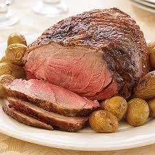 boneless leg of lamb and oven roasted potatoes with rosemary