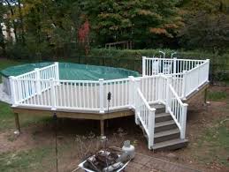 Every above ground pool needs a deck. Pin By Brenda Oakes On Outdoor Living Above Ground Pool Decks Pool Landscaping In Ground Pools