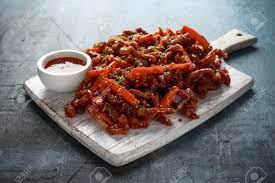 Every person i have served this dish to has commented on how much they love it and. Crispy Shredded Beef With Carrots And Sweet Chilli Sauce On White Stock Photo Picture And Royalty Free Image Image 119397475