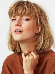 The Most Flattering Short Haircuts For Thick Hair Blonde Hair With Bangs Thick Hair Styles Haircut For Thick Hair