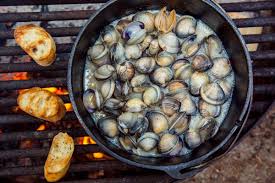 Put the clams in a pot or a pan with a lid. Campfire Steamed Clams Fresh Off The Grid