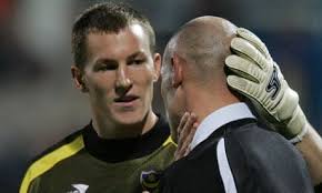 Jamie Ashdown saves shots and now tries to save Portsmouth