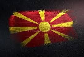 The flag consists of motif of a yellow sun with six axially symmetrical rays expanding towards the edges of. Republic Of Macedonia Flag Made Of Metallic Brush Paint On Grunge Dark Wall Stock Photo Image Of Abstract Black 124269010