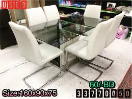 for sale glass dining table for 6 person size 160x90x75 leather white chair excellent condition price 60 bd للبيع طاولة طعا home decor furniture decor