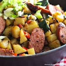 How to make sausage and potatoes skillet saute the diced onion in butter until translucent. Skillet Potato Hash With Zucchini And Smoked Sausages Melissassouthernstylekitchen Com