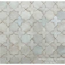 These are the top kitchen backsplash tile trends for 2021. White Moroccan Kitchen Tile White Moorish Tiles Moroccan Bathroom Bathroom Wall Tile White Moroccan Tile