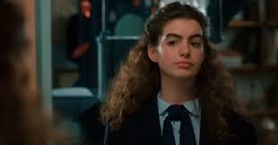 Anne hathaway light blonde bun hairstyle. I Tried The Princess Diaries Smooth Hair Makeover Teen Vogue