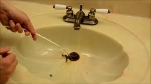 to fix slow draining sink