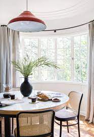 9 Solutions For How To Dress Awkward Windows Dining Room Windows Dining Nook Dining Room Inspiration